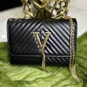 Black Quilted Chevron Shoulder Bag With Gold Chain And Tassel